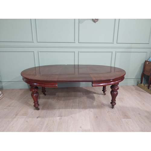 254 - Victorian mahogany D end dining table on four turned legs and brass castors. {73 cm H x 210 cm W x 1... 