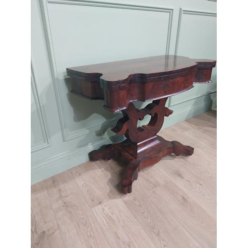 257 - William IV mahogany turn over leaf tea table with  platform base raised on four shaped outswept feet... 