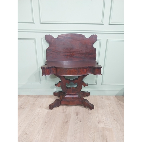 257 - William IV mahogany turn over leaf tea table with  platform base raised on four shaped outswept feet... 