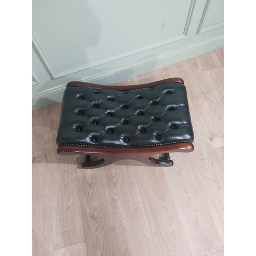 26 - Mahogany and leather footstool with turned stretchers. {38 cm H x 70 cm W x 44 cm D}.