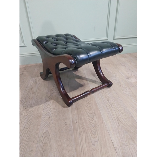 26 - Mahogany and leather footstool with turned stretchers. {38 cm H x 70 cm W x 44 cm D}.