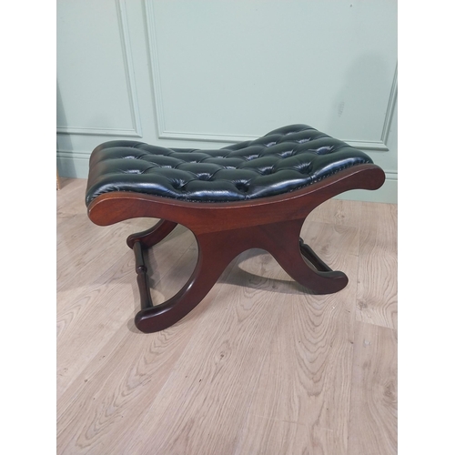 26 - Mahogany and leather footstool with turned stretchers. {38 cm H x 70 cm W x 44 cm D}.