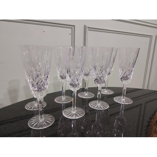 263 - Eight Waterford glass cut crystal champagne flutes. {18 cm H }.