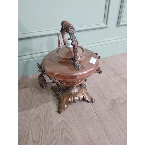 267 - Victorian Copper and brass kettle on stand. {40 cm H x 33 cm W x 28 cm D}.