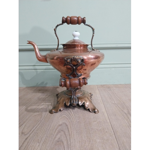 267 - Victorian Copper and brass kettle on stand. {40 cm H x 33 cm W x 28 cm D}.