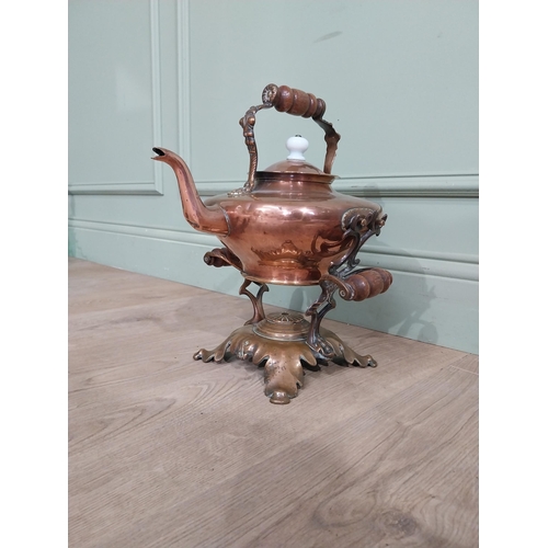 267 - Victorian Copper and brass kettle on stand. {40 cm H x 33 cm W x 28 cm D}.