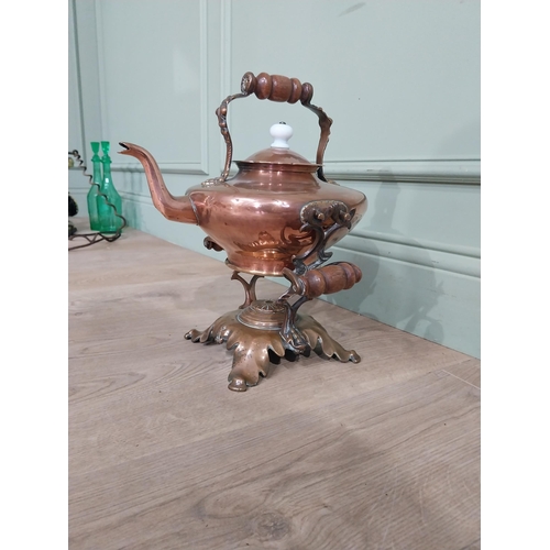 267 - Victorian Copper and brass kettle on stand. {40 cm H x 33 cm W x 28 cm D}.