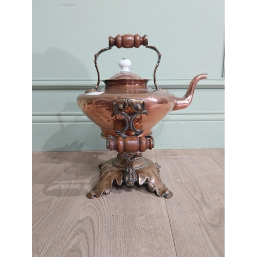 267 - Victorian Copper and brass kettle on stand. {40 cm H x 33 cm W x 28 cm D}.