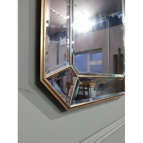 268 - Early 20th C. Brass framed Bellini mirror {70 cm H x 49 cm W}.