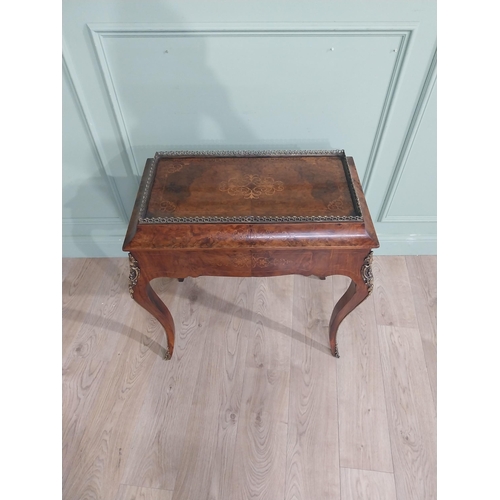 273 - 19th C. French walnut table with ormolu mounts and gallery raised on tapered shaped leg. {78 cm H x ... 