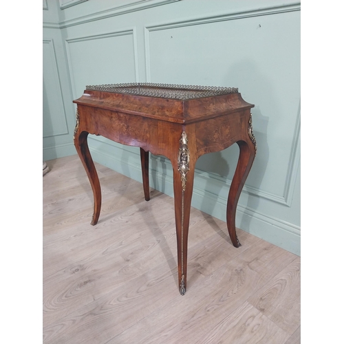 273 - 19th C. French walnut table with ormolu mounts and gallery raised on tapered shaped leg. {78 cm H x ... 