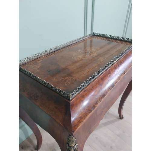 273 - 19th C. French walnut table with ormolu mounts and gallery raised on tapered shaped leg. {78 cm H x ... 