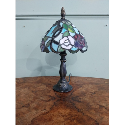 274 - Bronzed resin table lamp with Tiffany style shade. {37 cm H x 20 cm Dia.}.