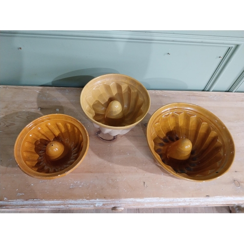 276 - Three early 20th C. Glazed terracotta Bundt cake moulds. {14 cm H x 25 cm Dia} to {11 cm H x 21 cm D... 