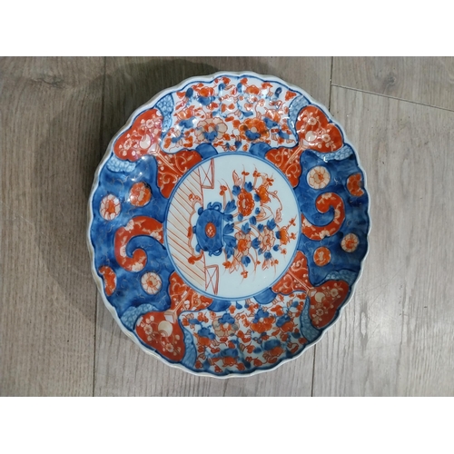 277 - Blue and white hand painted Dutch ceramic plate and decorative Oriental Imari plate. {22 cm Dia}.