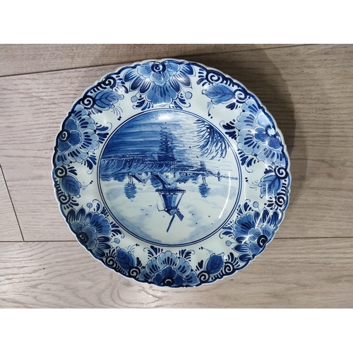 277 - Blue and white hand painted Dutch ceramic plate and decorative Oriental Imari plate. {22 cm Dia}.