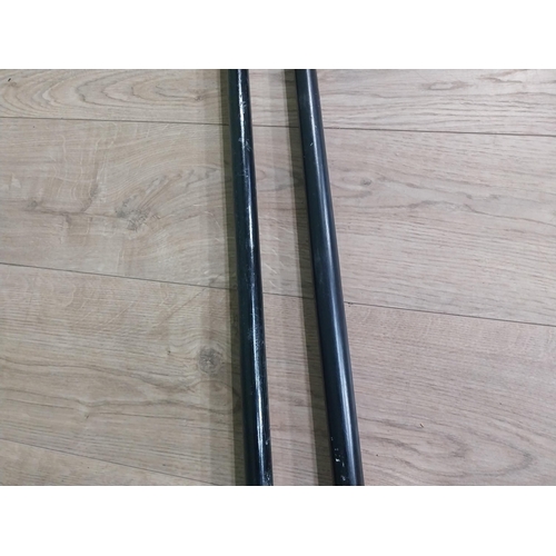 279 - Two silver plate and ebonised walking sticks. {95 cm H} and {90 cm H}.