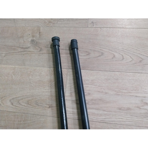 279 - Two silver plate and ebonised walking sticks. {95 cm H} and {90 cm H}.