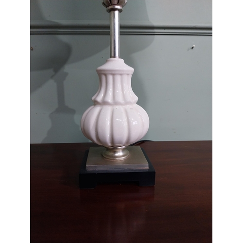 284 - Ceramic table lamp with cloth shade. {75 cm H x 29 cm Dia.}.