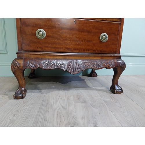 285 - Edwardian mahogany tallboy with seven graduated drawers above carved apron on claw and ball feet. {1... 