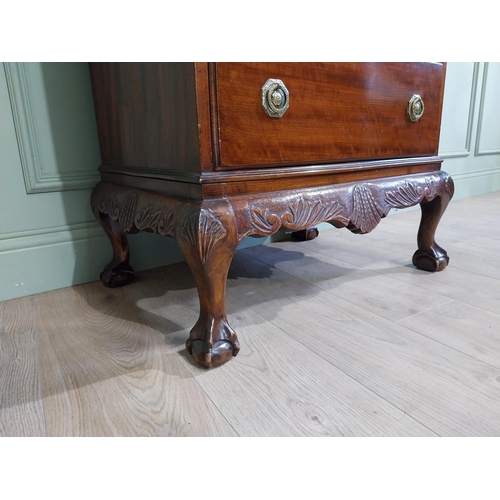 285 - Edwardian mahogany tallboy with seven graduated drawers above carved apron on claw and ball feet. {1... 