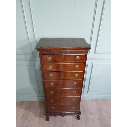 285 - Edwardian mahogany tallboy with seven graduated drawers above carved apron on claw and ball feet. {1... 