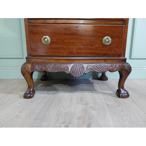 285 - Edwardian mahogany tallboy with seven graduated drawers above carved apron on claw and ball feet. {1... 