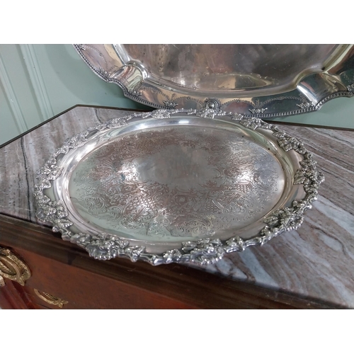 286 - Two Edwardian silver plate serving trays. {60 cm H x 42 cm W}  and {35 cm Dia.}.