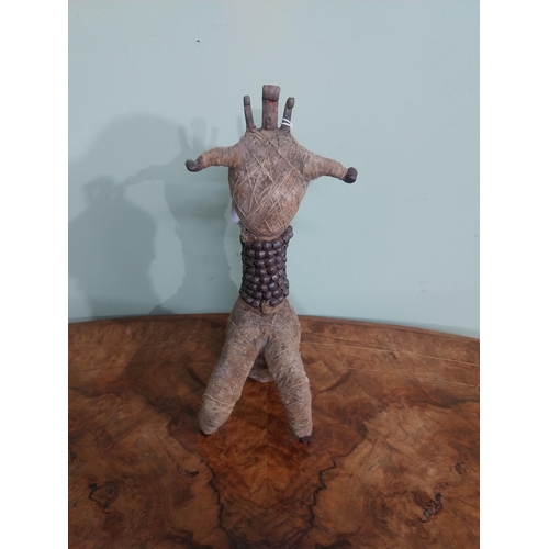 287 - Unusual wrought iron and  twine African sculpture. {28 cm H x 11 cm W x 12 cm D].