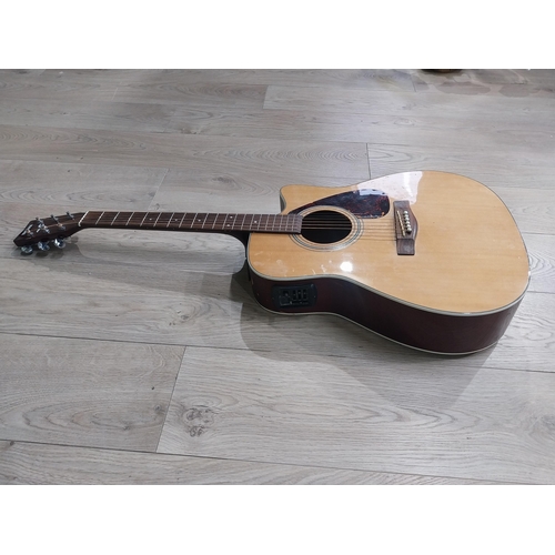 289 - Yamaha Guitar in soft case.