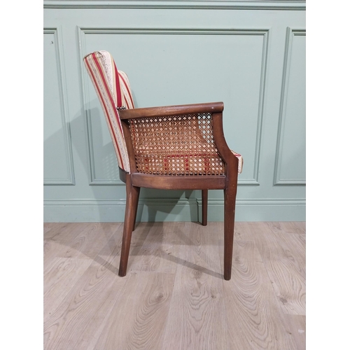 296 - 1950�s mahogany and upholstered armchair on square tapered legs. {85 cm H x 60 cm W x 50 cm D}.