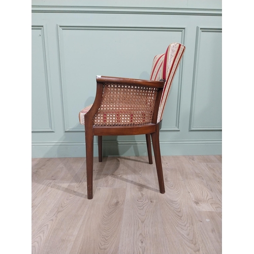 296 - 1950�s mahogany and upholstered armchair on square tapered legs. {85 cm H x 60 cm W x 50 cm D}.