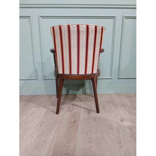 296 - 1950�s mahogany and upholstered armchair on square tapered legs. {85 cm H x 60 cm W x 50 cm D}.