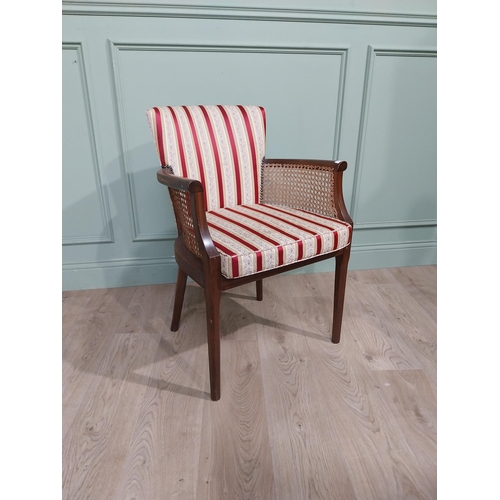 296 - 1950�s mahogany and upholstered armchair on square tapered legs. {85 cm H x 60 cm W x 50 cm D}.