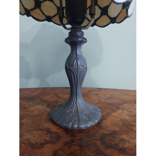 300 - Bronzed resin table lamp with Tiffany style shade. {36 cm H  x 20 cm Dia.}.