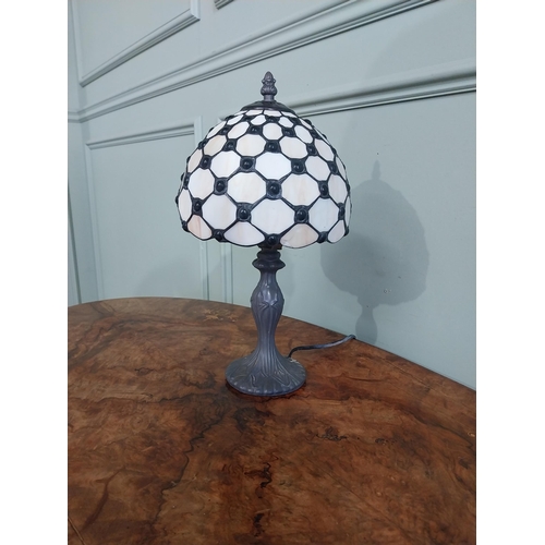 300 - Bronzed resin table lamp with Tiffany style shade. {36 cm H  x 20 cm Dia.}.