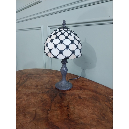 300 - Bronzed resin table lamp with Tiffany style shade. {36 cm H  x 20 cm Dia.}.