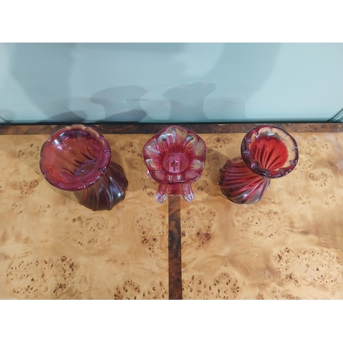 302 - Three ruby glass vases. {24 cm H}