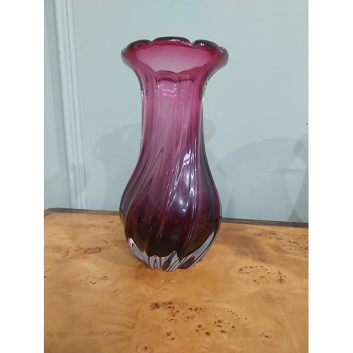 302 - Three ruby glass vases. {24 cm H}