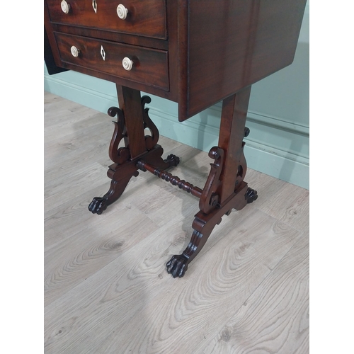 303 - William IV mahogany lamp table with two short drawers in frieze raised on turned carved supports wit... 