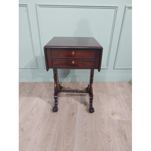 303 - William IV mahogany lamp table with two short drawers in frieze raised on turned carved supports wit... 