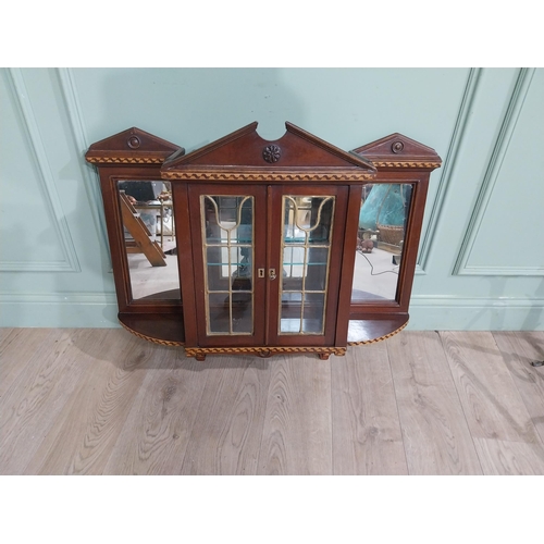 305 - Edwardian and  satinwood mirrored back wall cabinet. {78 cm H x  91 cm W  x 23 cm D}.