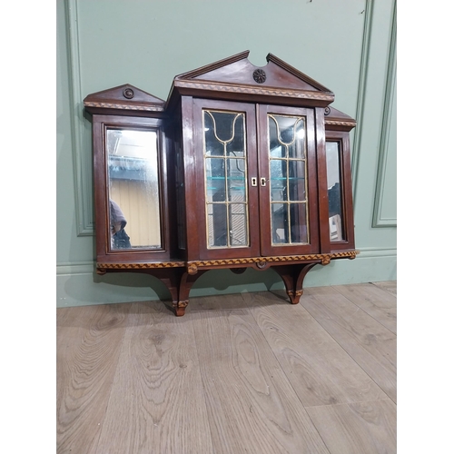 305 - Edwardian and  satinwood mirrored back wall cabinet. {78 cm H x  91 cm W  x 23 cm D}.