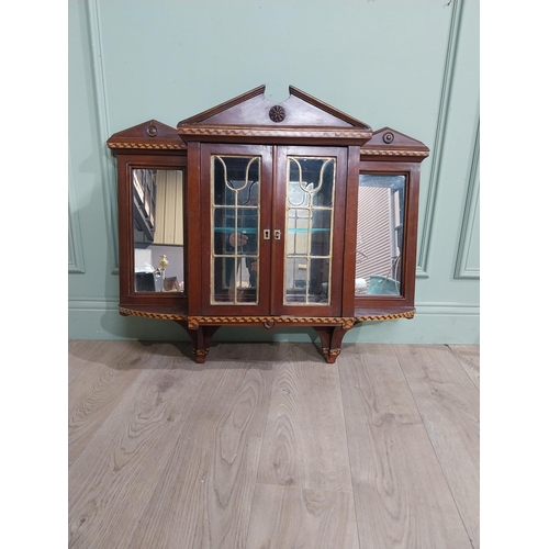 305 - Edwardian and  satinwood mirrored back wall cabinet. {78 cm H x  91 cm W  x 23 cm D}.