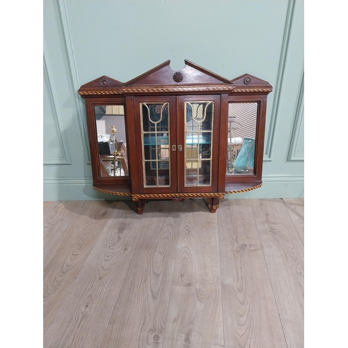 305 - Edwardian and  satinwood mirrored back wall cabinet. {78 cm H x  91 cm W  x 23 cm D}.