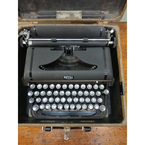 306 - Cased royal typewriter. {H12cm x W 28cm x D 28cm}. NOT AVAILABLE TO VIEW IN PERSON