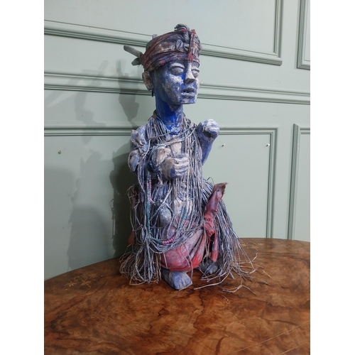 307 - African painted Fetish Figure. {55 cm H x 30 cm W x 25 cm D}.