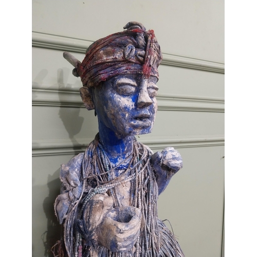 307 - African painted Fetish Figure. {55 cm H x 30 cm W x 25 cm D}.