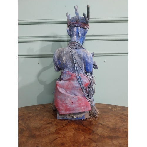 307 - African painted Fetish Figure. {55 cm H x 30 cm W x 25 cm D}.