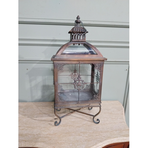 314 - Copperised metal and glass lantern. {61 cm H x 26 cm W x 17 cm D}.